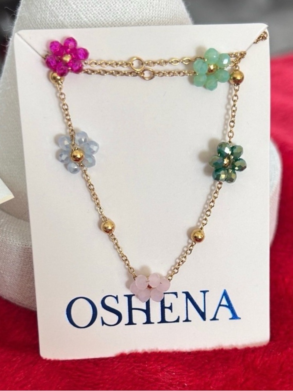 Oshena designer beachwear Gold Blossom
Floral choker necklace